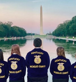 support students wearing FFA uniform facing the Washington Monument